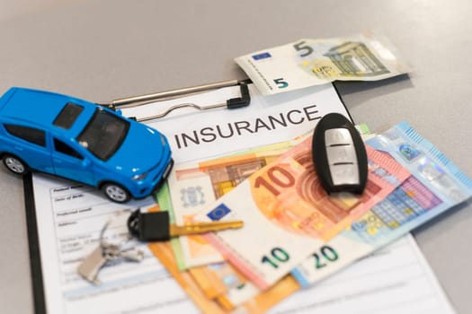 Car insurance form with model and policy document . High quality photo