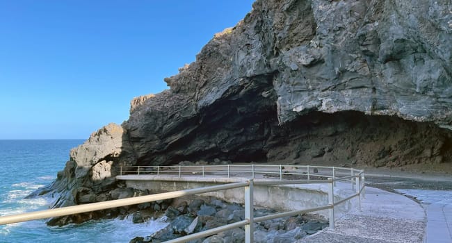 Cave of Achbinico, Sanctuary rock in Candelaria, Canary Island, Rocky coast, Tenerife. High quality photo