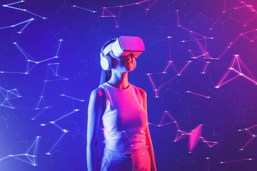 Female stand in cyberpunk neon light wear white VR headset and tank top connecting metaverse, future cyberspace community technology, She look in virtual reality object holding goggles. Hallucination.