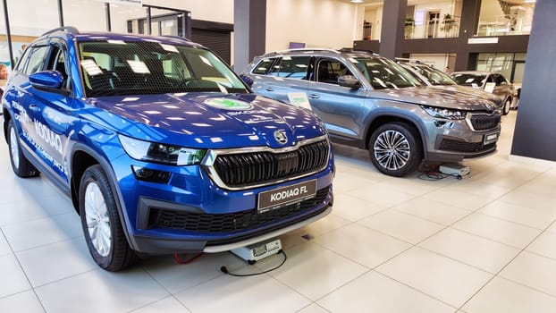 Kazan, Russia - April 04, 2023: Cars in showroom of dealership Skoda. Re-export to Russia