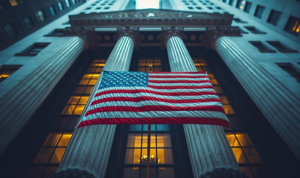 American flag displayed on exterior wall of a building.