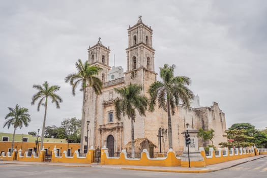 The Templo de San Servacio stands tall against the Valladolid skyline, a historic landmark in this vibrant Mexican town, offering a glimpse into its rich cultural heritage.