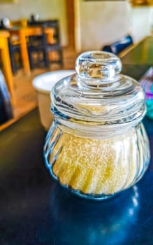 Sugar salt and pepper shaker in restaurant in Zicatela Puerto Escondido Oaxaca Mexico.