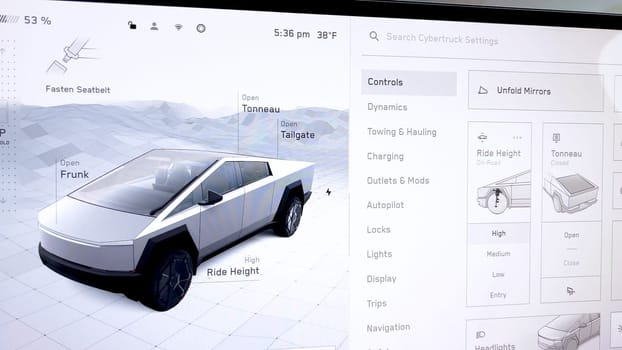 Denver, Colorado, USA-April 28, 2024- Highlighting the Tesla Cybertruck state-of-the-art touchscreen interface, this image shows the detailed control panel that allows drivers to adjust vehicle settings such as ride height, mirror positioning, and more, enhancing the driving experience with modern technology.