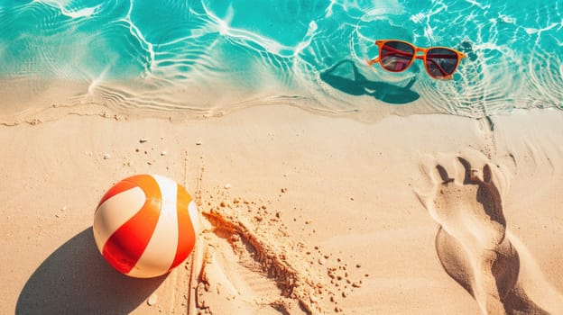 A beach ball and sunglasses are lying on the sandy shore, creating a colorful contrast against the landscape. Its a pictureperfect scene for leisure and recreation AIG50
