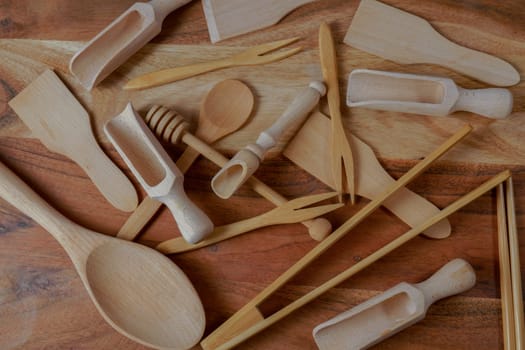 top view of a group of handmade wooden kitchen utensils