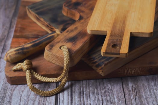 close-up of various wooden cutting boards used in the kitchen