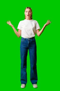 Young Woman in White T-shirt Making a Surprised Face on green background