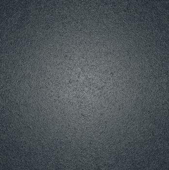 The texture of the background is gray with a rough glossy surface