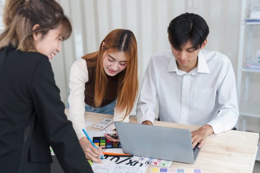 Close up ux developer and ui designer brainstorming interface wireframe design.Creative digital development agency.