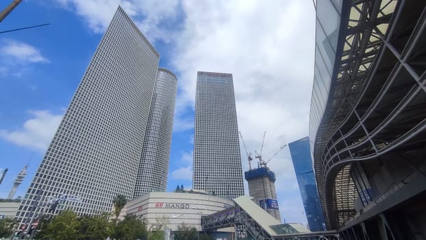 15 April 2024 Tel Aviv city Israel, Azrieli buildings, ambulance car. High quality photo