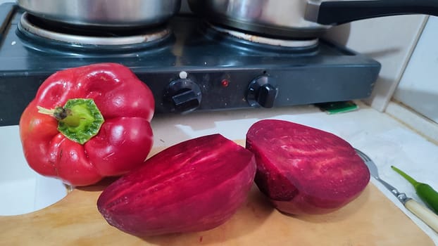 sweet red pepper, beets, vegetables food in the kitchen. High quality photo