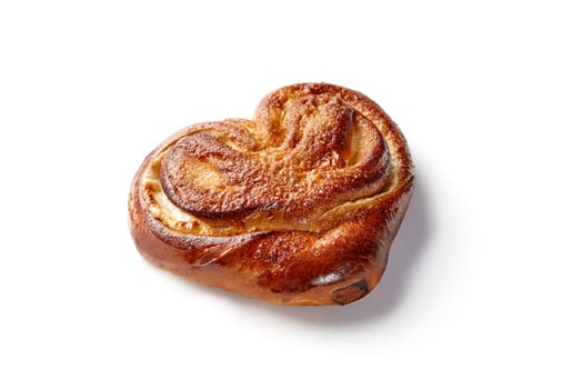 Fluffy golden sugar-dusted sweet bun filled with delicate custard, traditional Eastern European pastry, presented on white background