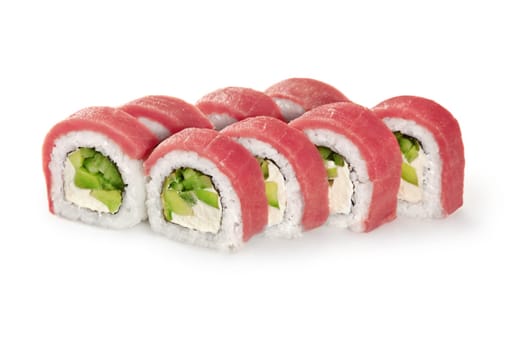 Appetizing Philadelphia sushi rolls filled with cream cheese, avocado and cucumbers topped with fresh tuna fillet, isolated on white background. Popular Japanese dish