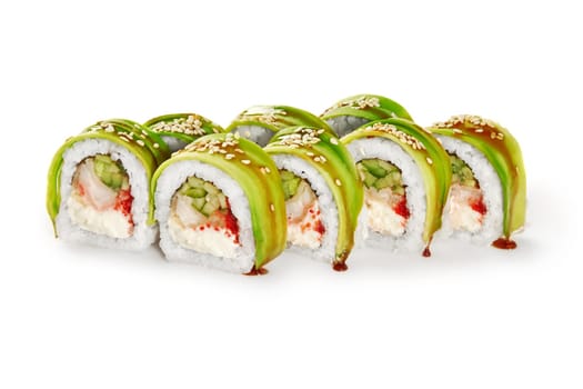 Green dragon rolls with tempura perch, cream cheese, cucumber and tobiko topped with avocado slices, unagi sauce and sesame, isolated on white background