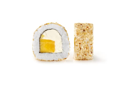 Closeup of enticing sweet and savory sushi roll in sesame seeds, with cream cheese and ripe juicy mango filling, presented on white background