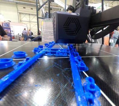 3D printer printing object close-up. Process creating three-dimensional model on 3d printer. Additive printer technology. 3D Prototyping. 3D design modeling. New modern innovation printing technology