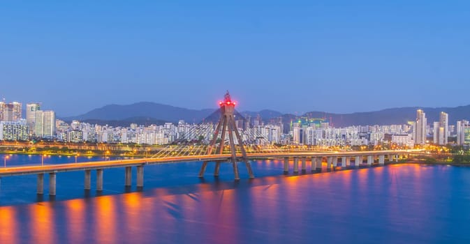 Skyline of seoul, the capital city of south korea with Han River at sunset