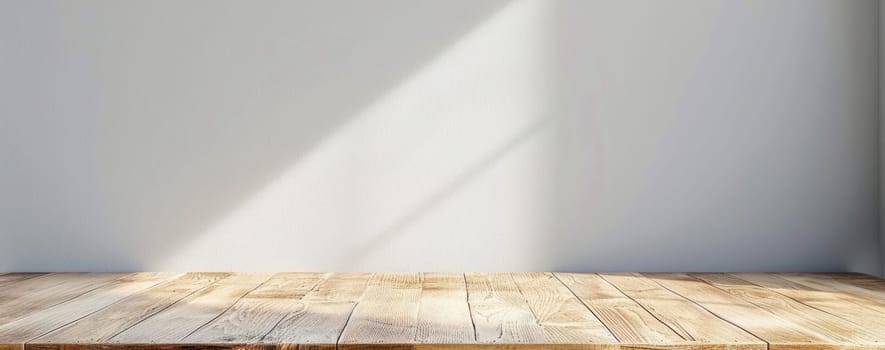 A wooden table with a white wall behind it by AI generated image.