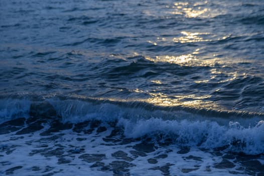 Bright sunset over the Mediterranean Sea Cyprus golden clouds reflected in the water 1