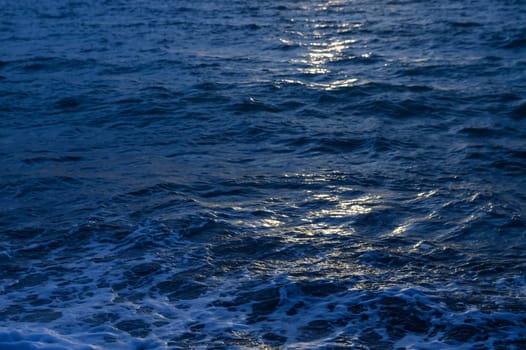 Bright sunset over the Mediterranean Sea Cyprus golden clouds reflected in the water 2