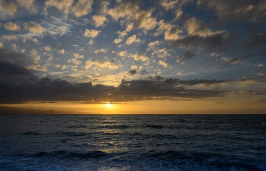 Sunset over an island in the Mediterranean Sea in the spring season 2