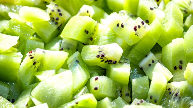 Ripe kiwi fruit. Detail of chopped exotic kiwi fruits used for desserts