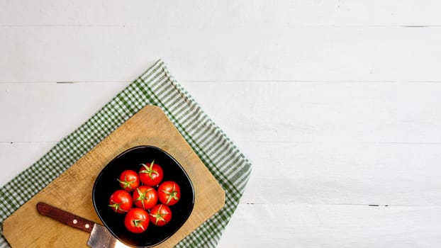 Italian pasta ingredients. Cherry tomato and spices for cooking