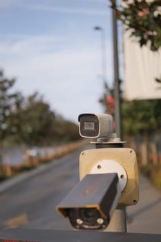 Urban security camera placements near vehicles captured in video footage.