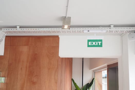 emergency exit door inside of a building .