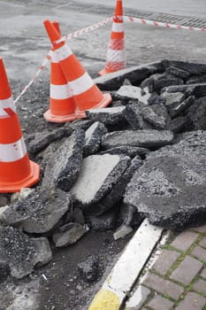 Big pot hole filled with water at street