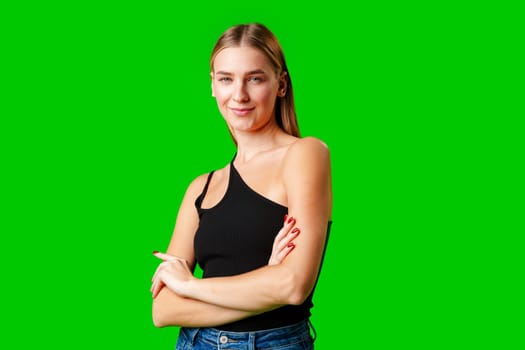 Blonde Woman in Black Tank Top Posing for Picture in studio