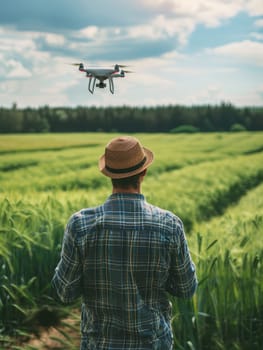 A farmer stands in a vast wheat field, remotely piloting a drone under a wide azure sky. This image depicts modern agriculture where tradition meets advanced technology