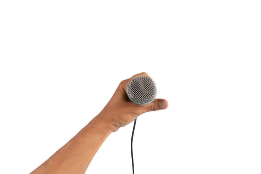 Black male singer hand holding a microphone isolated on white background. High quality photo