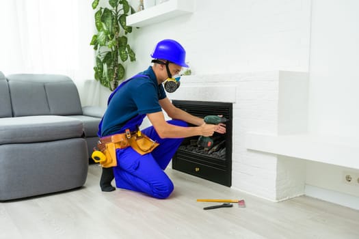 Fireplace installing in white brick wall.