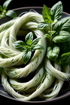 homemade green vermicelli with herbs .