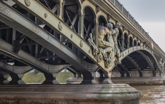 France, Paris - Jan 04, 2024 - Detail of Sculptures decorating the two level bridge Bir Akime (Pont de Bir-Hakeim steel bridge) across the Seine River in Paris. Destinations in Europe. Space for text, Selective focus.