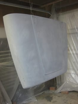 Auto Body Repair, Primer Gray Hood, 1990s Vehicle Restoration . High quality photo