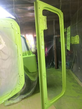 DIY Auto Body Work, Windshield Frame, Lime Green Paint Job, 1990s Vehicle . High quality photo