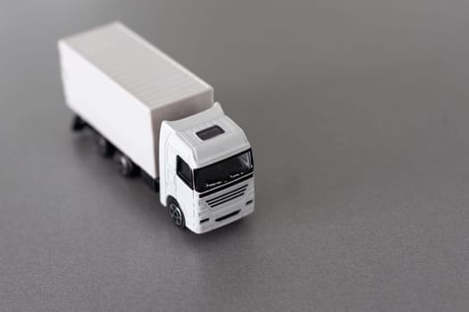 White cargo delivery truck miniature isolated on white background with clipping path. High quality photo