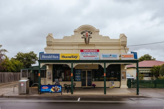 BRUTHEN, AUSTRALIA - APRIL 06 2024: The quaint township of Bruthen and general store on a cloudy wet day in Gippsland, Victoria, Australia