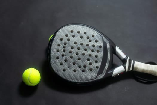 Isolated paddle tennis objects black background. High quality photo