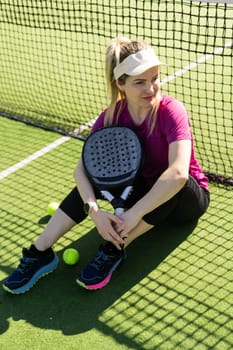 One women playing Paddle tennis. High quality photo