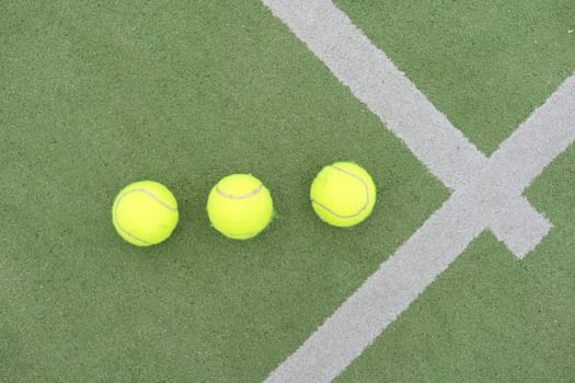 Tennis ball on green grass. High quality photo