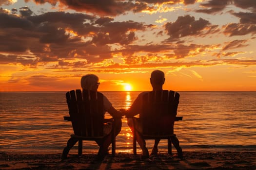 A retired couple enjoys a serene sunset from their comfortable chairs overlooking the ocean, capturing a moment of peaceful reflection and togetherness in a picturesque setting.