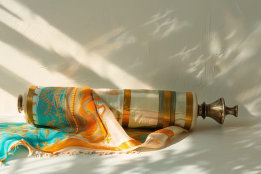 A Torah scroll adorned with an embroidered cover rests in gentle morning sunlight, evoking the warmth and traditions of Shavuot.