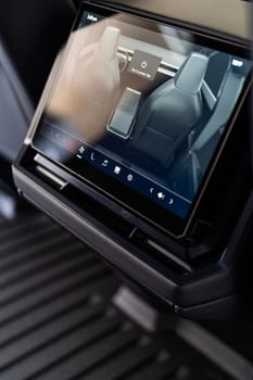 Denver, Colorado, USA-May 5, 2024-This image captures the sophisticated rear seat screen interface in the Tesla Cybertruck, highlighting the vehicle cutting-edge technology and user-friendly features, offering passengers control and comfort during their journey.