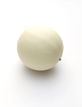 Isolated Organic Honeydew Melon On White Background, Cucumis Melo Inodorus Group. Ripe Nutritious Summer Juicy Fruit. Vertical Plane. Harvesting. High quality photo