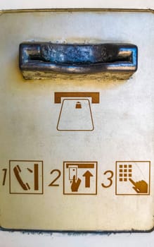 Old telephone box with handset and keypad in Zicatela Puerto Escondido Oaxaca Mexico.