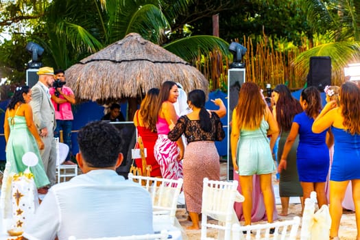 Playa del Carmen Quintana Roo Mexico 14. August 2023 Dancing bouquet toss and party at a Mexican wedding reception in Playa del Carmen Quintana Roo Mexico.